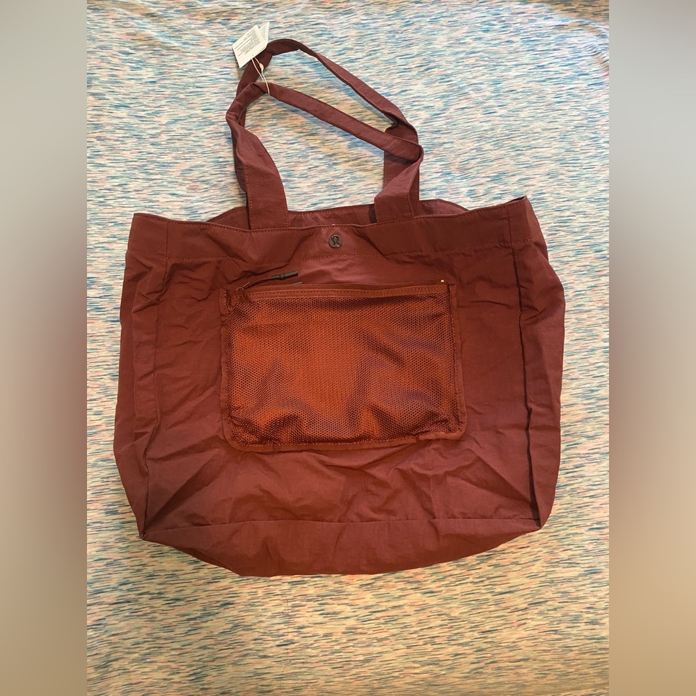 Brand new tag have been removed Lululemon pack the pocket Tote